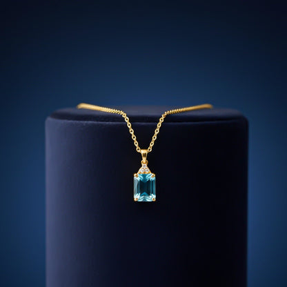 Silver Blue Topaz Emerald Cut Pendant