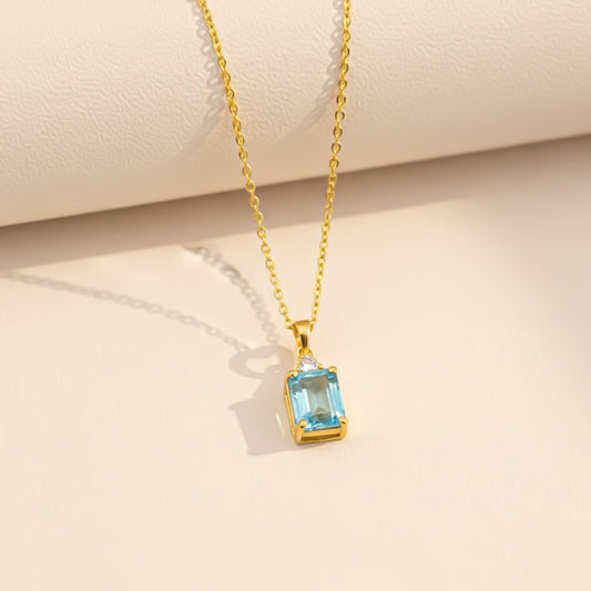 Silver Blue Topaz Emerald Cut Pendant
