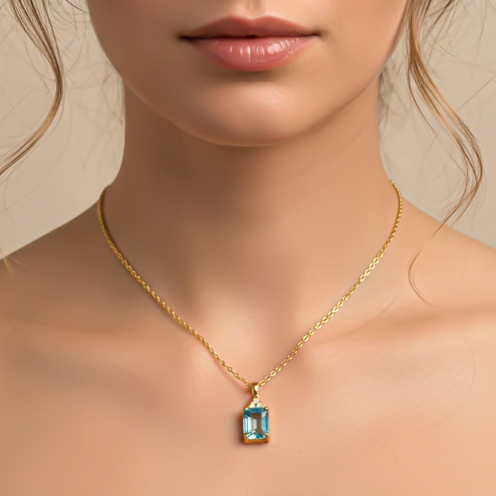 Silver Blue Topaz Emerald Cut Pendant