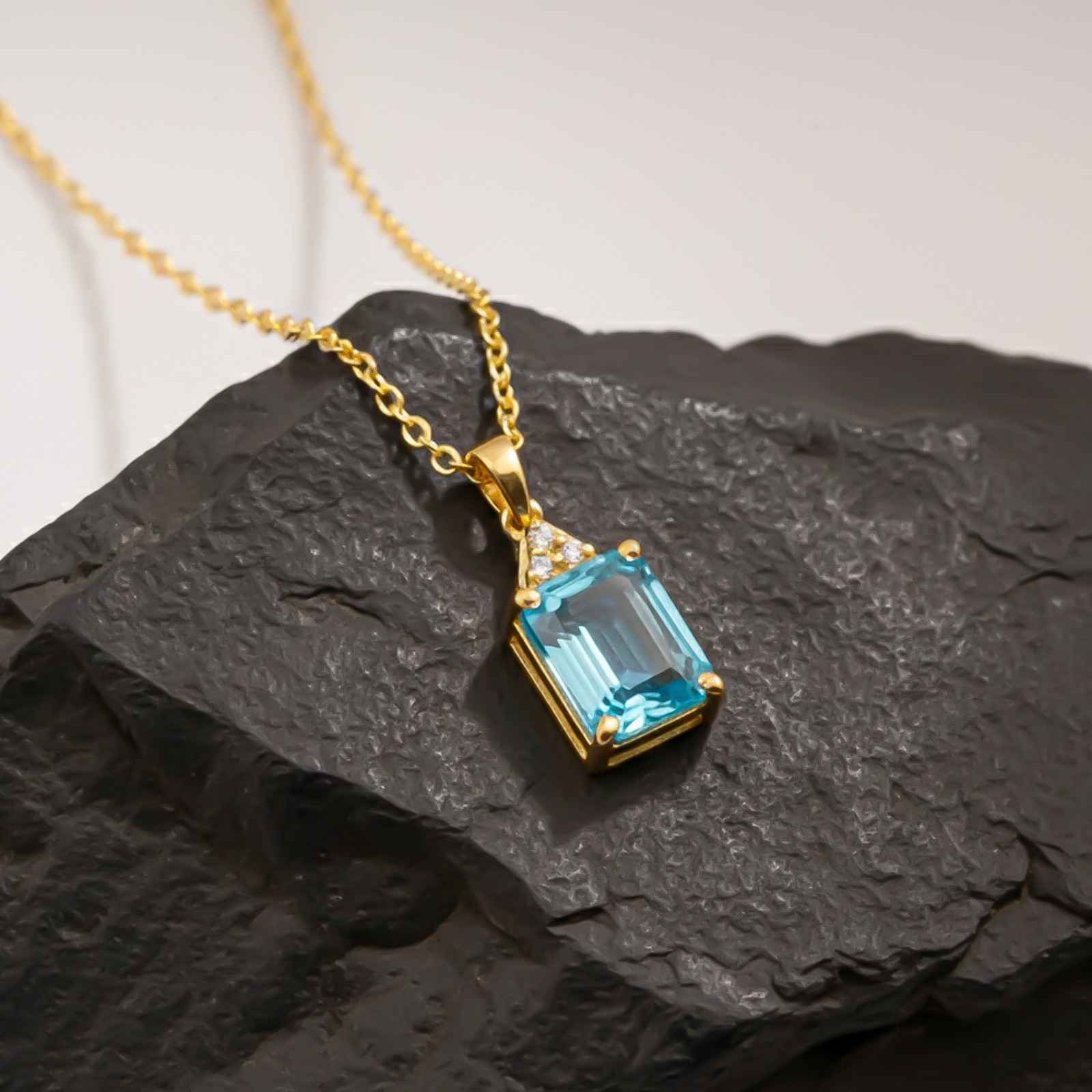 Silver Blue Topaz Emerald Cut Pendant