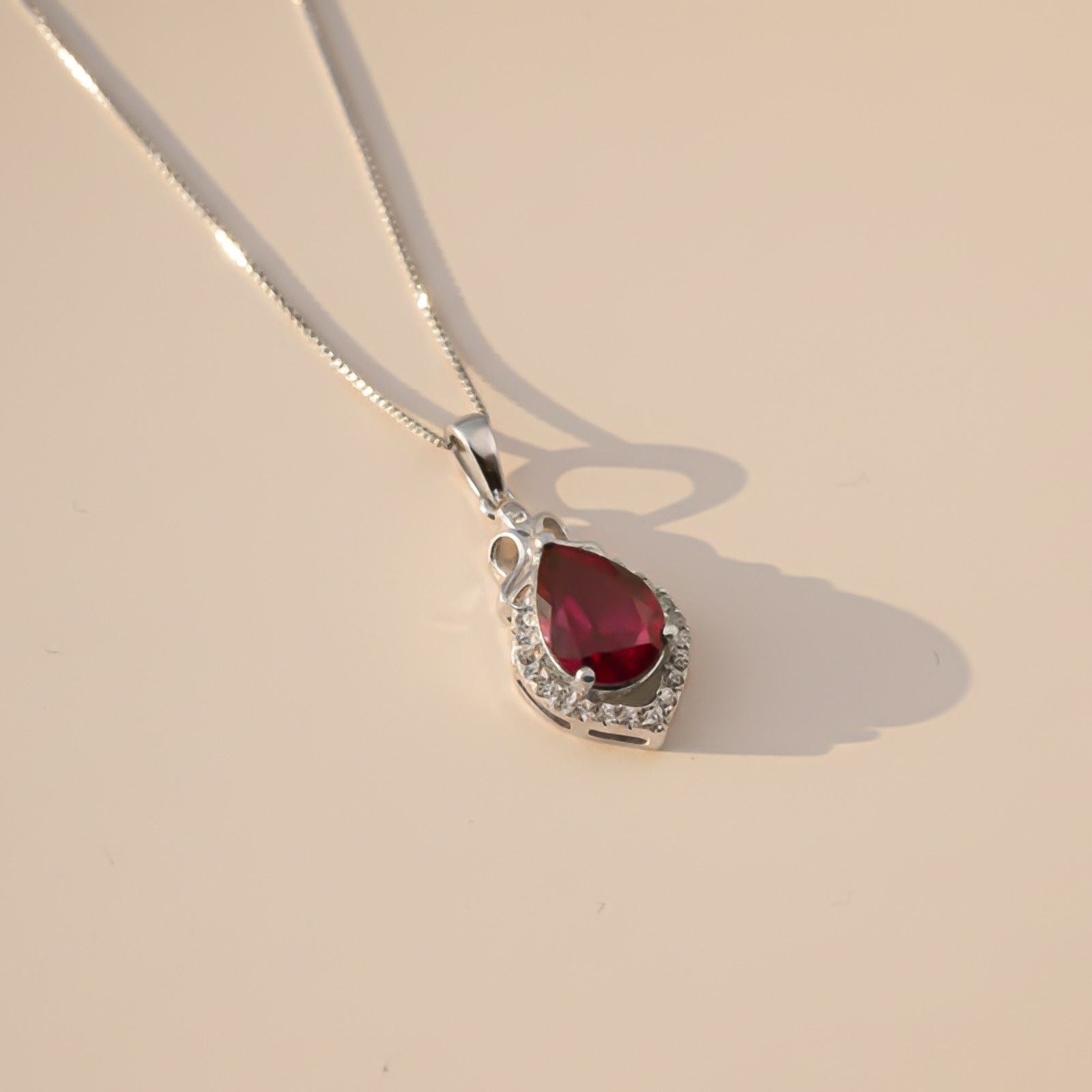 Silver Red Ruby Teardrop Halo Pendant
