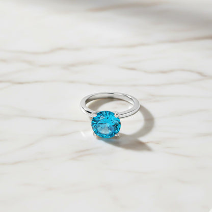Silver Blue Topaz Diamond Solitaire Ring