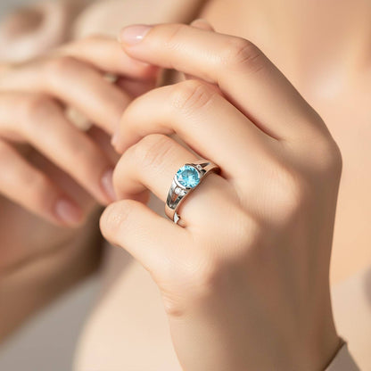 Silver Solitaire Topaz Ring