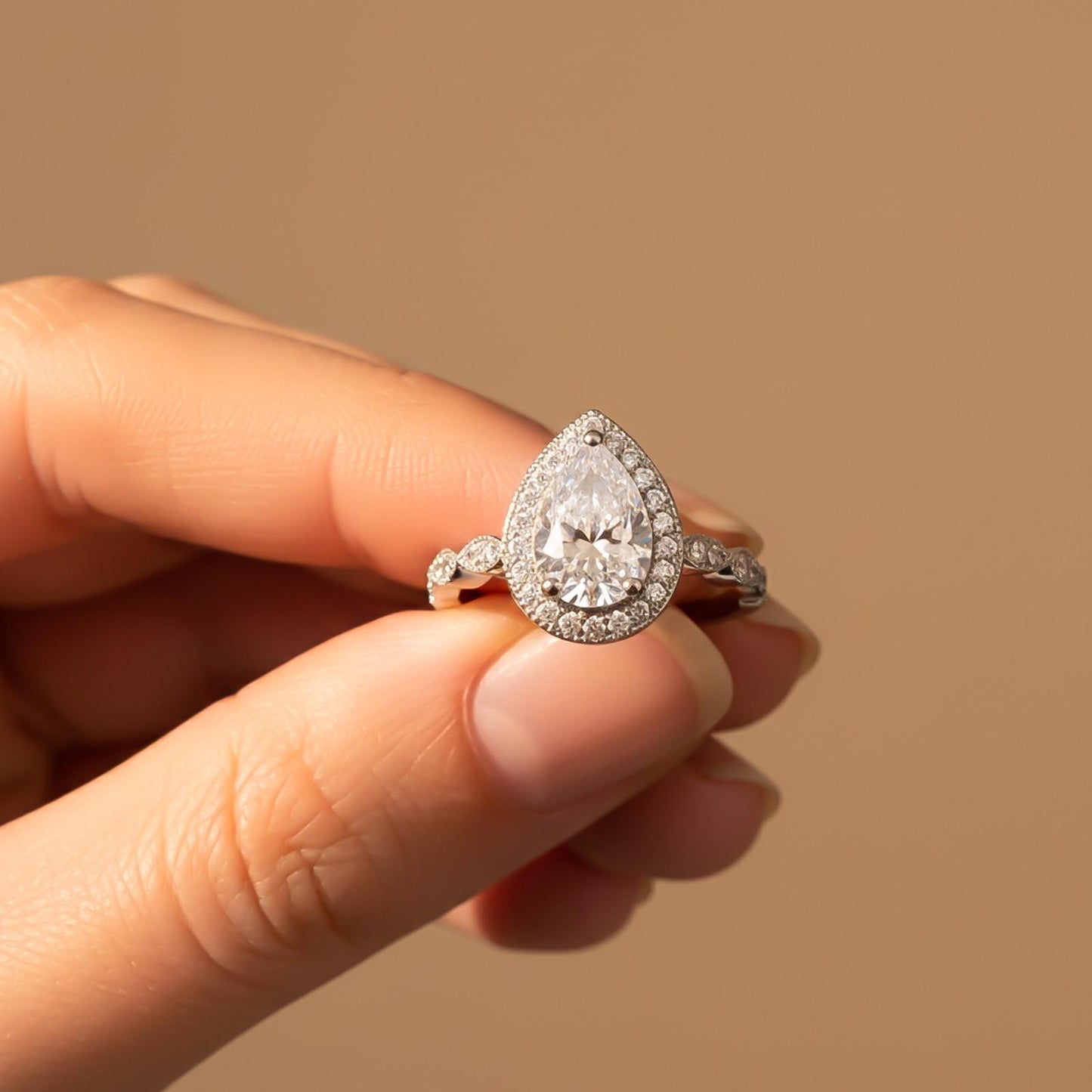 Silver Halo Pear Zircon Ring