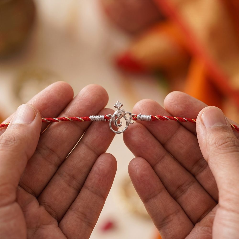 Silver Om Mini Ganesha Rakhi