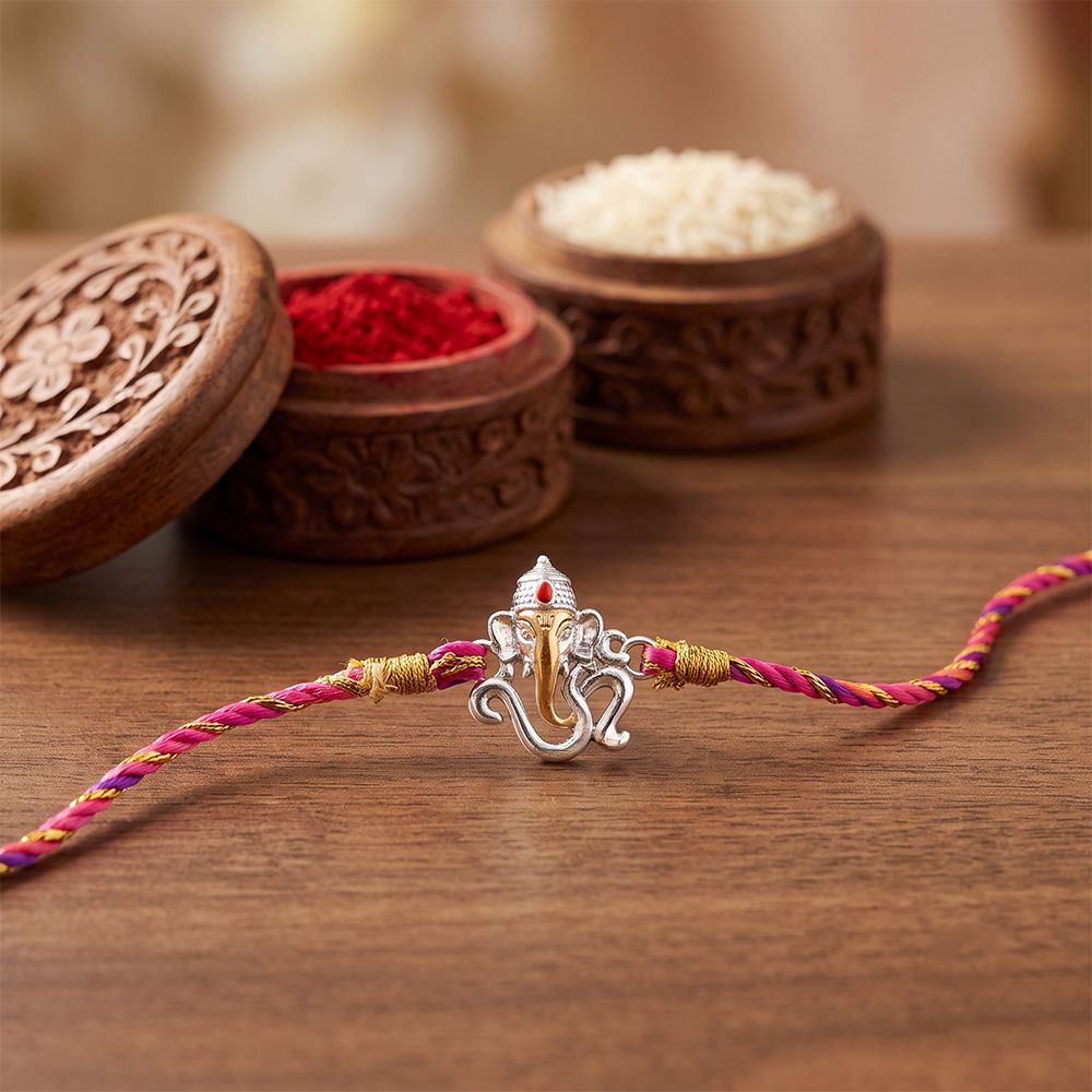 Dual Tone OM Ganesh Face Rakhi