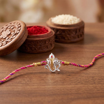 Dual Tone OM Ganesh Face Rakhi