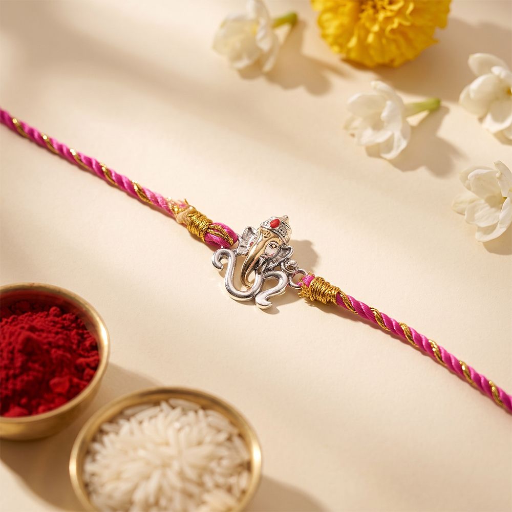 Dual Tone OM Ganesh Face Rakhi