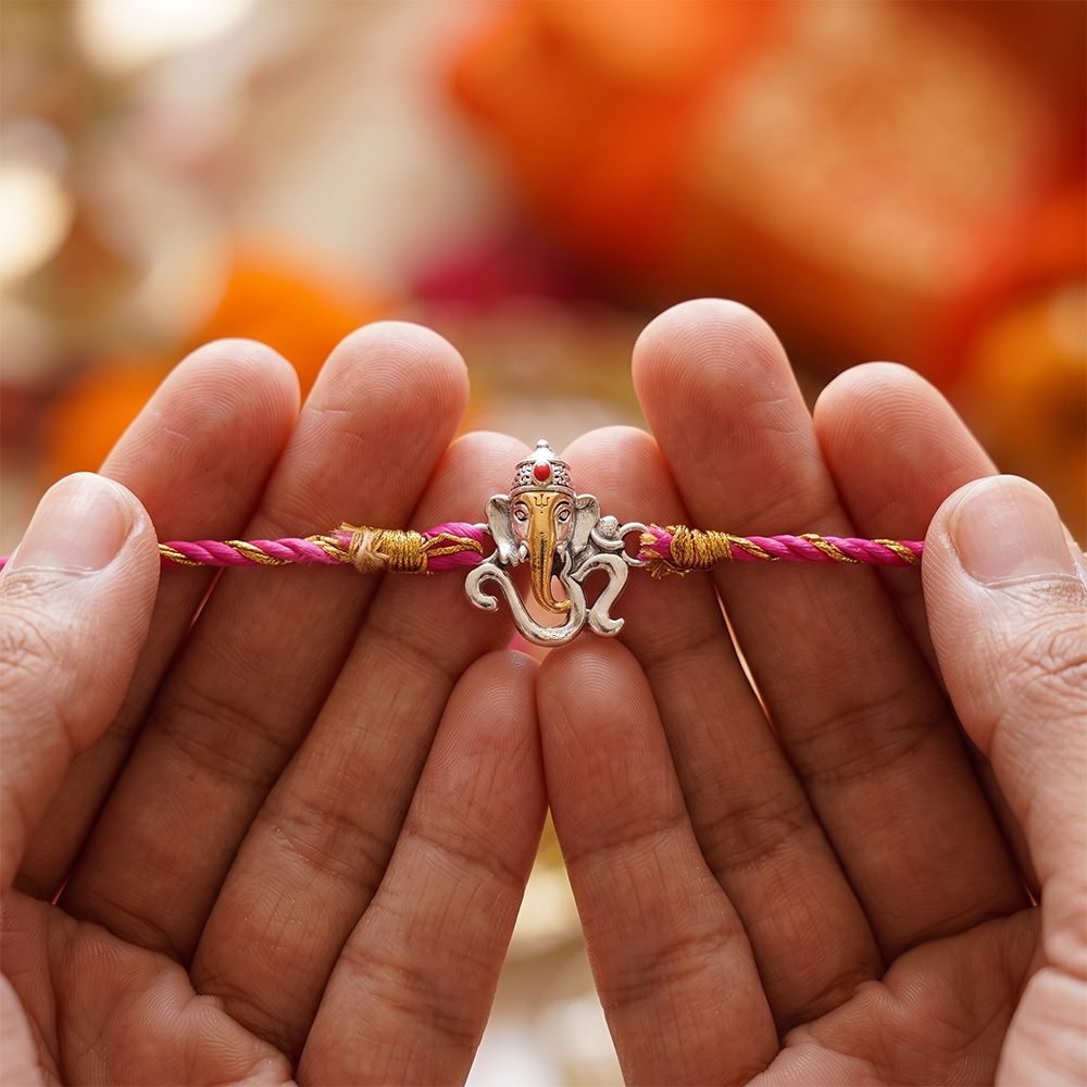 Dual Tone OM Ganesh Face Rakhi