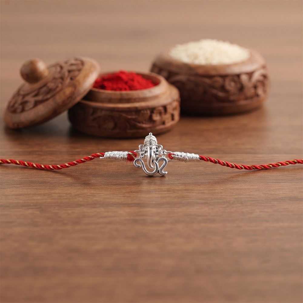 Silver OM Ganesh Face Rakhi