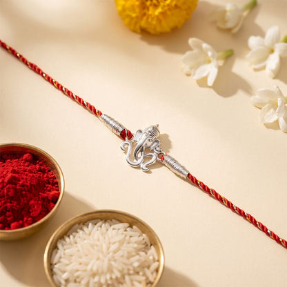 Silver OM Ganesh Face Rakhi