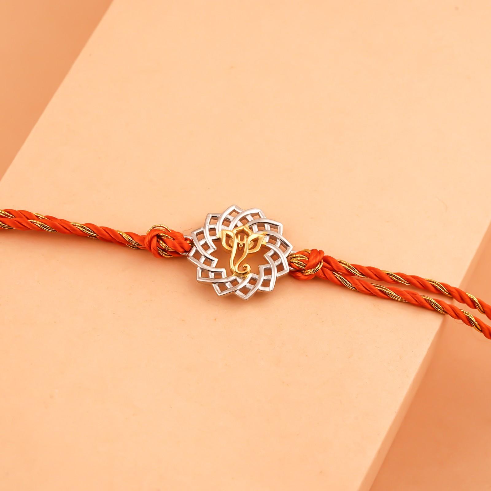 Silver Rakhi: Silver Protected Ganesha Rakhi