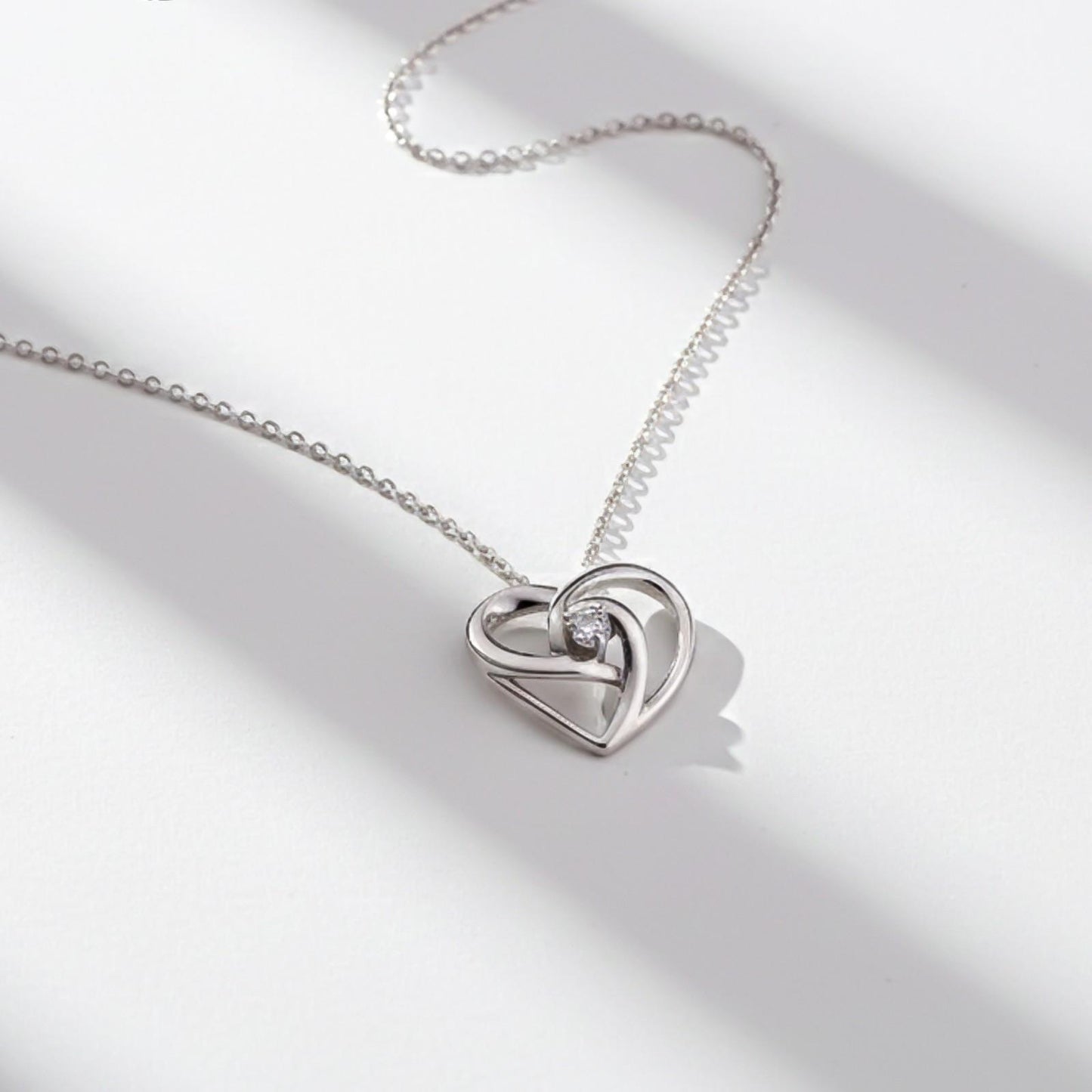 Silver Double Heart Twist Pendant & Earrings Set