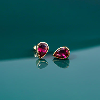 Golden Pear Shape Ruby Stud Earrings
