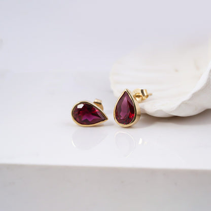 Golden Pear Shape Ruby Stud Earrings