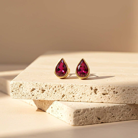 Golden Pear Shape Ruby Stud Earrings