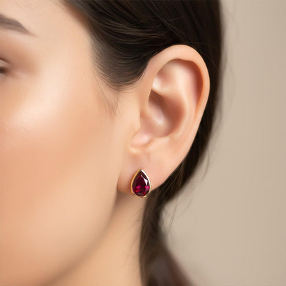 Golden Pear Shape Ruby Stud Earrings
